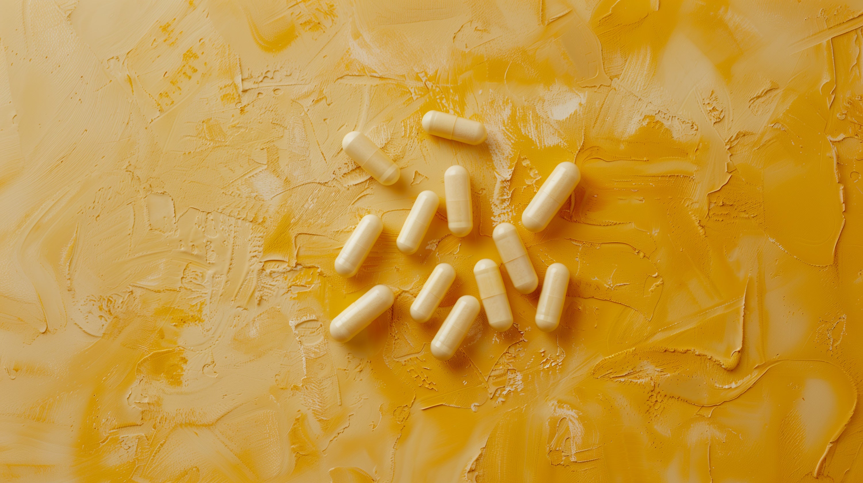 Play Kanna Dailies capsules from Kanna Extract Co. on golden textured background, formulated with kanna and functional nootropics